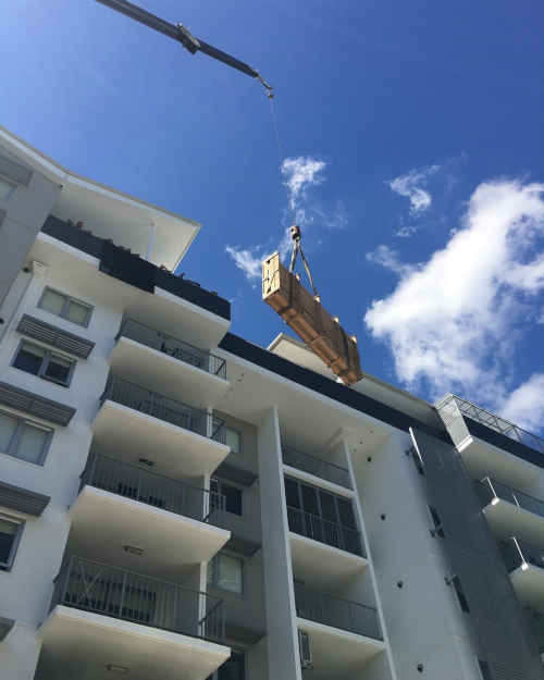 lifting furniture into apartment building