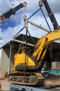 dual franna crane lift placing excavator on truck bed for transport brisbane qld