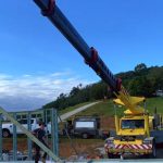 franna-crane-hire-assisting-builder-during-beam-installation-brisbane-qld franna crane hire assisting builder during beam installation brisbane qld