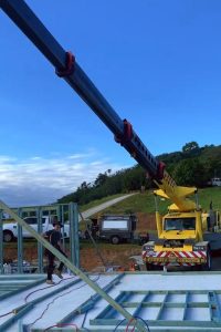 franna crane hire assisting builder during beam installation brisbane qld