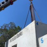 franna taxi crane lifting concrete tanks during installation brisbane qld